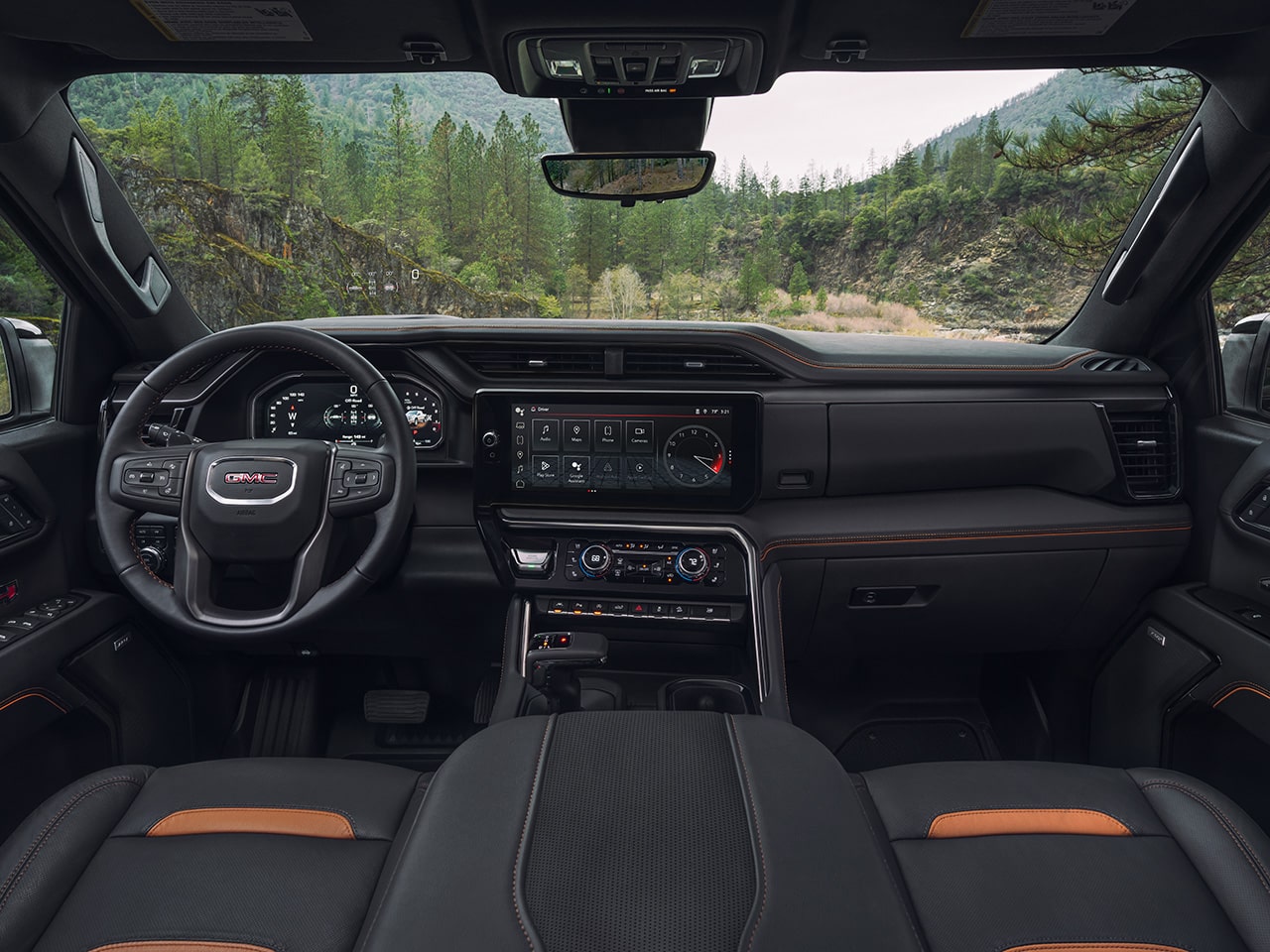 Interior View of the Dashboard and Infotainment System in the 2026 GMC Sierra AT4 Off-Road Truck