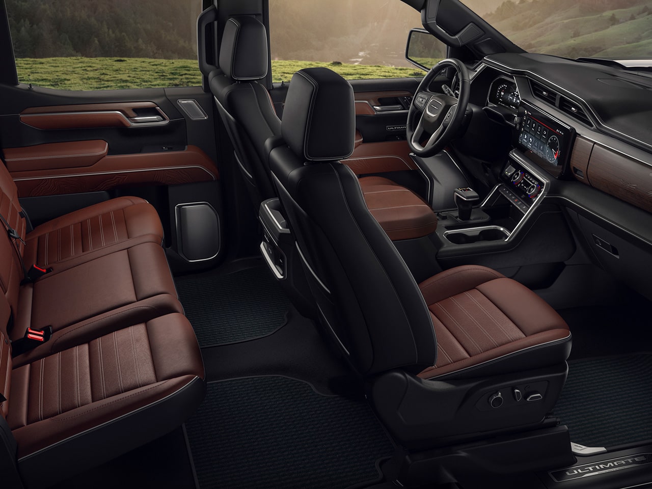 Profile View of the Interior Front and Back Row Seating in the 2026 GMC Sierra Denali Luxury Pickup Truck