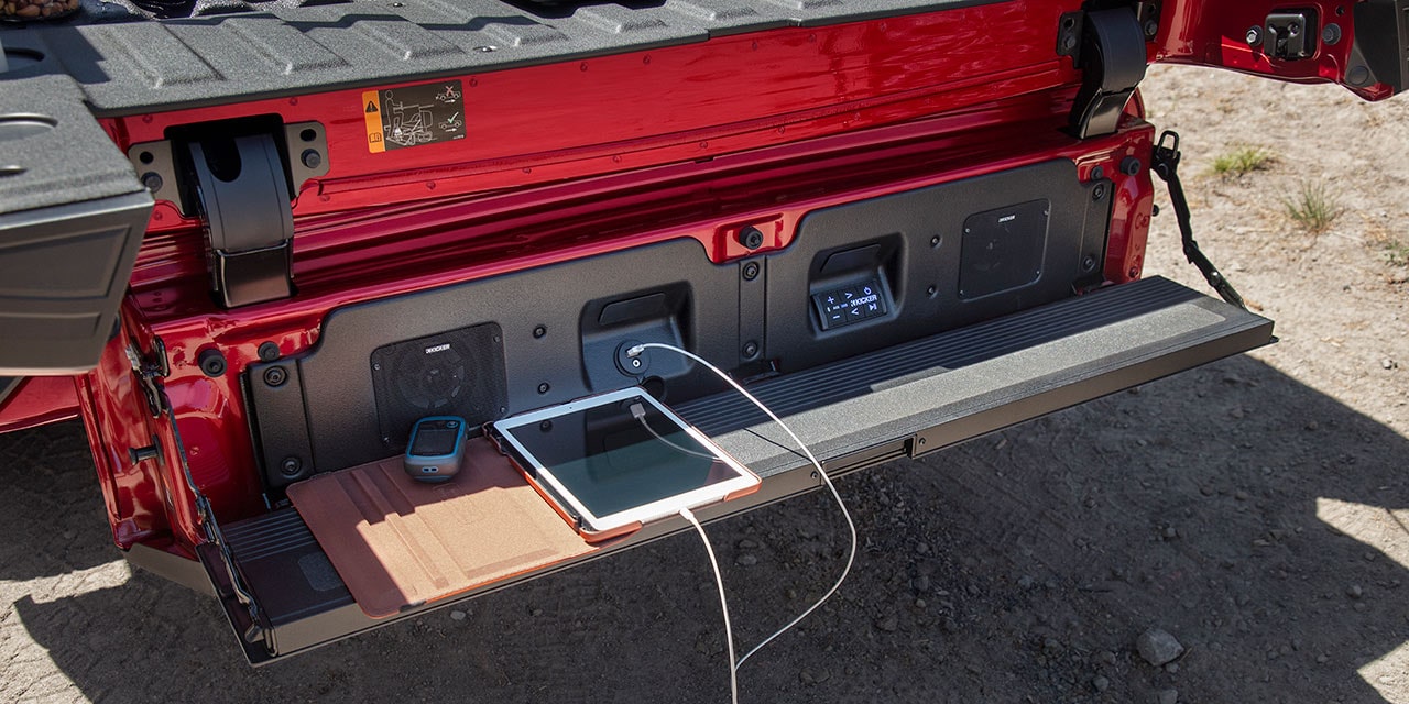 Exterior View of an iPad Plugged into the Mutlipro Audio System on the 2026 GMC Sierra 1500 Pickup Truck