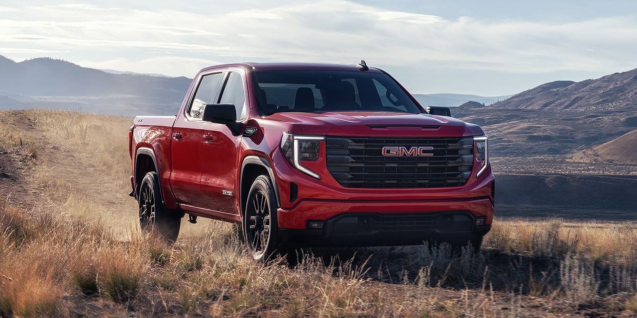 The 2026 GMC Sierra 1500 Pickup Truck Parked in a Beautiful Mountain Range