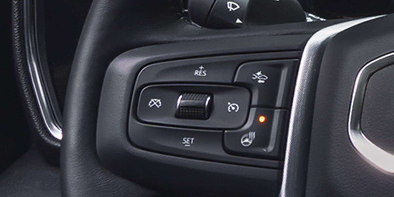 Close-up of the Super Cruise Controls on the GMC Steering Wheel