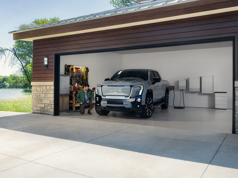 2025 GMC Sierra EV Pickup Truck Parked in a Garage